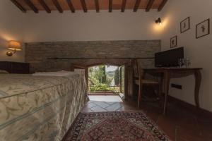 Posteľ alebo postele v izbe v ubytovaní Relais Santa Cristina