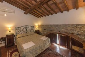 Posteľ alebo postele v izbe v ubytovaní Relais Santa Cristina