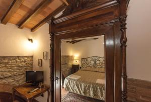 Posteľ alebo postele v izbe v ubytovaní Relais Santa Cristina