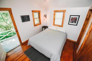 Postel nebo postele na pokoji v ubytování Rainbow Mountain Resort - LGBTQ Friendly