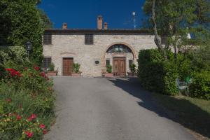 Fotografia z galérie ubytovania Relais Santa Cristina v destinácii Radda in Chianti