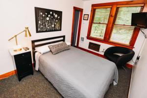 Postel nebo postele na pokoji v ubytování Rainbow Mountain Resort - LGBTQ Friendly