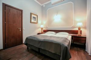 Letto o letti in una camera di Tea for Two Hotel