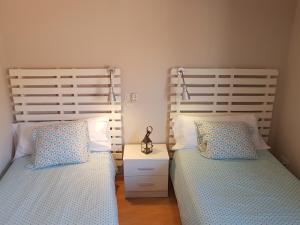 Posteľ alebo postele v izbe v ubytovaní Apartamentos Albero