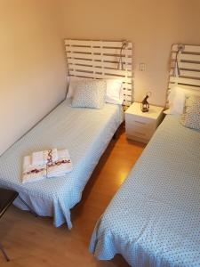 Posteľ alebo postele v izbe v ubytovaní Apartamentos Albero