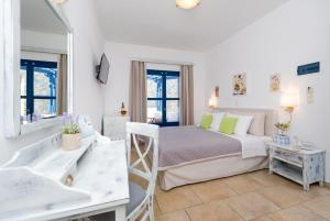 Voodi või voodid majutusasutuse Hotel Mathios toas