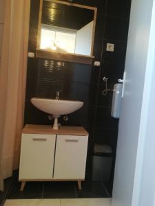 Kúpeľňa v ubytovaní Apartman Aria & Amadea + 37 fotografií