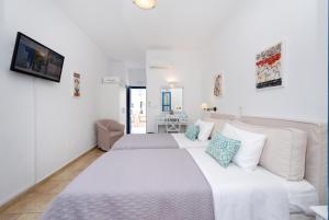 Voodi või voodid majutusasutuse Hotel Mathios toas