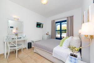 Voodi või voodid majutusasutuse Hotel Mathios toas