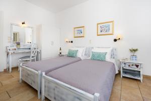 Voodi või voodid majutusasutuse Hotel Mathios toas