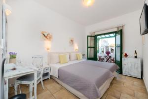 Voodi või voodid majutusasutuse Hotel Mathios toas