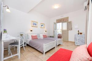 Voodi või voodid majutusasutuse Hotel Mathios toas