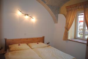 Posteľ alebo postele v izbe v ubytovaní Gartler's Appartements