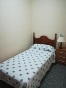 Cama o camas de una habitación en Vivienda Rural Alcazaba