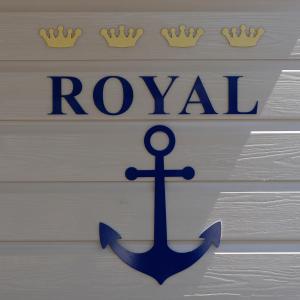 a sign with an anchor and the words ronav at Floating House Marina Royal in Portorož