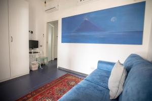 TV a/nebo společenská místnost v ubytování Il Gabbiano Relais in Stromboli