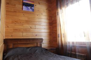 Кровать или кровати в номере Guest House SunCity-Иней