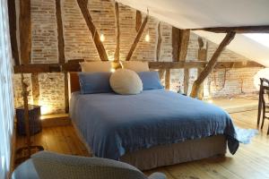 Postel nebo postele na pokoji v ubytování Impasse du Boeuf