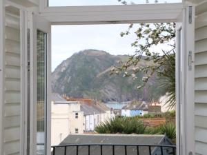 a window view of the ocean from a house at 10 Cove View in Ilfracombe
