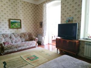 TV a/nebo společenská místnost v ubytování Sweet Home