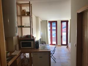 Η κουζίνα ή μικρή κουζίνα στο Casa Portas 8&10 +17 φωτογραφίες