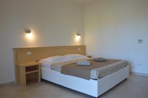 Postel nebo postele na pokoji v ubytování Guest Rooms Affittacamere