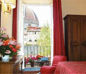 Postel nebo postele na pokoji v ubytování Hotel California