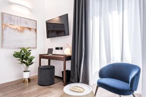 TV a/nebo společenská místnost v ubytování La Spezia by The First - Luxury Rooms & Suites