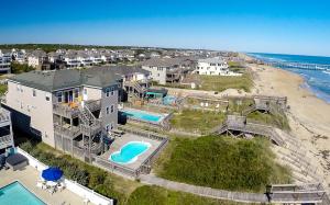 an aerial view of a house and a beach at Serenity in Nags Head in Nags Head