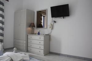 A television and/or entertainment centre at Kalypso Apartments