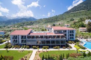 an aerial view of a building with a resort at Princess Golden Beach Hotel in Chrysi Ammoudia