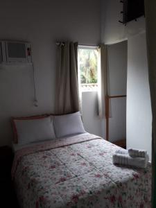 Postel nebo postele na pokoji v ubytování som das aguas paraty