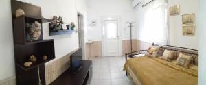 A bed or beds in a room at Polianthi Seaside House