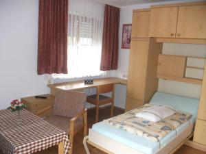 Кровать или кровати в номере Appartemant Steineberg