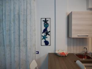 Nhà bếp/bếp nhỏ tại Casa Vacanza Trabocco +3 ảnh