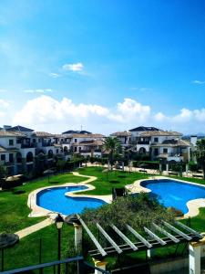 una vista de la piscina en un resort en HOME STAR IV con vistas, en Vera