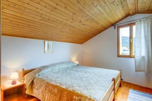 Postel nebo postele na pokoji v ubytování House Mihaela