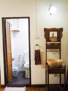 a bathroom with a sink and a toilet at Rustic Guest House in Chiang Mai +55 photos