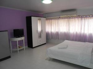 Postel nebo postele na pokoji v ubytování MT-Room