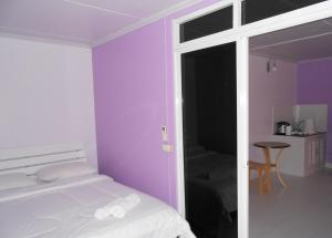 Postel nebo postele na pokoji v ubytování MT-Room