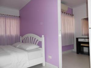 Postel nebo postele na pokoji v ubytování MT-Room