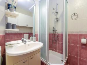 a bathroom with a sink and a shower at Apartment Nenad in Dramalj +14 photos