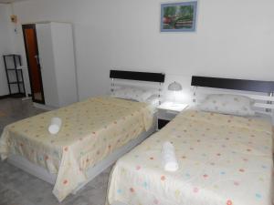 Postel nebo postele na pokoji v ubytování MT-Room