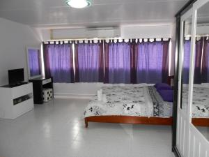 Postel nebo postele na pokoji v ubytování MT-Room