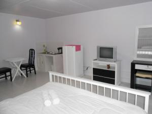 TV a/nebo společenská místnost v ubytování MT-Room