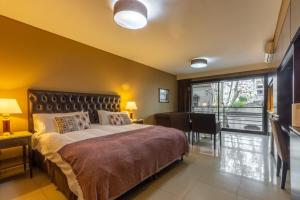 En eller flere senge i et værelse på Silky Studio in Palermo Hollywood + 49 billeder