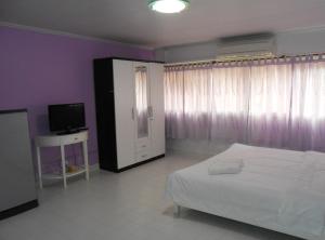Postel nebo postele na pokoji v ubytování MT-Room