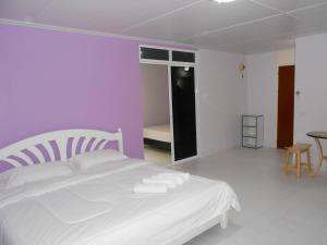 Postel nebo postele na pokoji v ubytování MT-Room