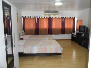 Postel nebo postele na pokoji v ubytování MT-Room