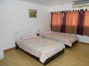 Postel nebo postele na pokoji v ubytování MT-Room